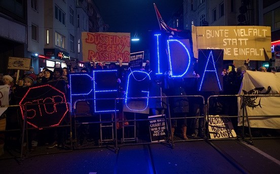 GERMANY-IMMIGRATION-FARRIGHT-FRANCE-ATTACKS-CHARLIE-HEBDO