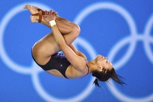 Malaysia's Pandelela Rinong Pamg performs a dive during the women's 10m platform semi-final at the London 2012 Olympic Games at the Aquatics Centre
