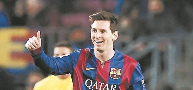 Barcelona's Lionel Messi celebrates his goal against Villarreal during their King's Cup semi-final first leg soccer match at Nou Camp stadium in Barcelona