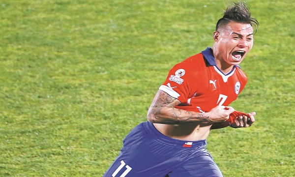 Chile's Eduardo Vargas celebrates his second goal against Peru during their Copa America 2015 semi-final soccer match at the National Stadium in Santiago