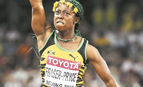 Fraser-Pryce of Jamaica reacts after winning the women's 100m event during the 15th IAAF World Championships at the National Stadium in Beijing