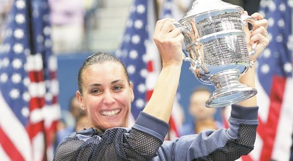 Pennetta of Italy holds the U.S. Open Trophy after defeating compatriot Vinci in their women's singles final match at the U.S. Open Championships tennis tournament in New York