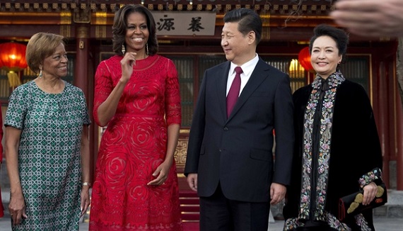 U.S. first lady Michelle Obama, her mother Marian Robinson share a light moment with Chinese President Xi and his wife Peng Liyuan after a photograph session at the Diaoyutai State guest house in Beijing