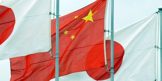 150930020649_china_japan_flags_976x549_afp_nocredit