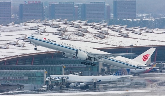 aircraft-are-seen-at-the-beijing-capital-international-airport-on-nov-23-2015_700_466_c1