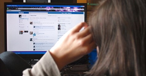 Teenage girl using facebook. Image shot 2011. Exact date unknown.