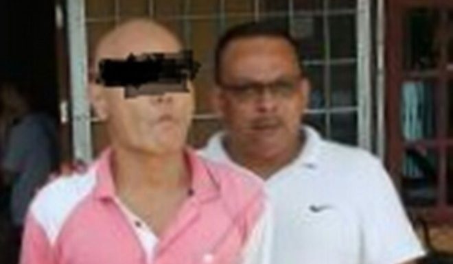 儿子被疑偷手机 火爆父挥棍打亲友