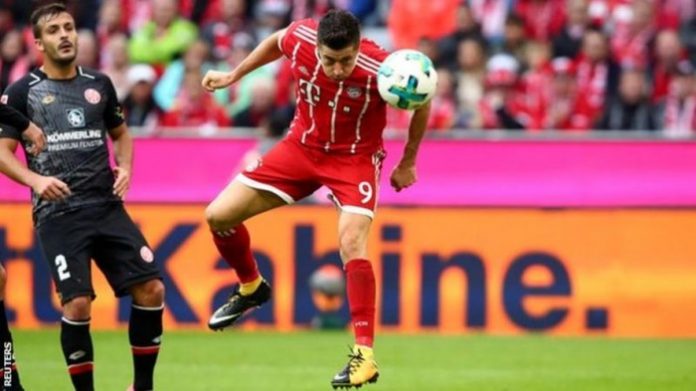 _97833619_lewa-goal-reu