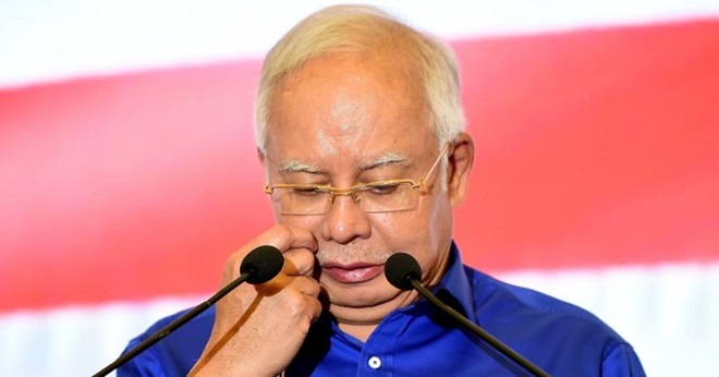 najib-razak-looking-glum-barisan-nasional-ge14-presser