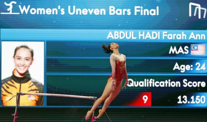 2018-08-23T114358Z_1316757513_HP1EE8N0WL9TD_RTRMADP_3_GAMES-ASIA-GYMNASTICS