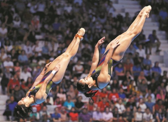 2018-08-29T120615Z_1669435347_HP1EE8T0XMEPI_RTRMADP_3_GAMES-ASIA-DIVING
