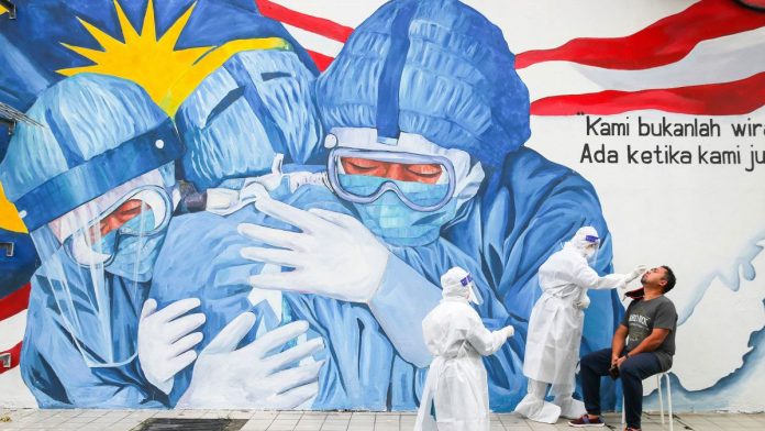 https___cdn.cnn.com_cnnnext_dam_assets_210112022253-01-malaysia-coronavirus-0111-restricted