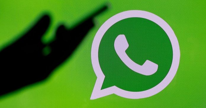 whatsapp logo phone shadow getty