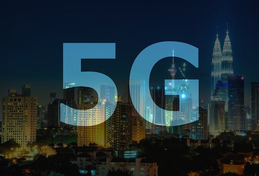 Canva-5G-text-on-Kuala-Lumpur-Malaysia-background.