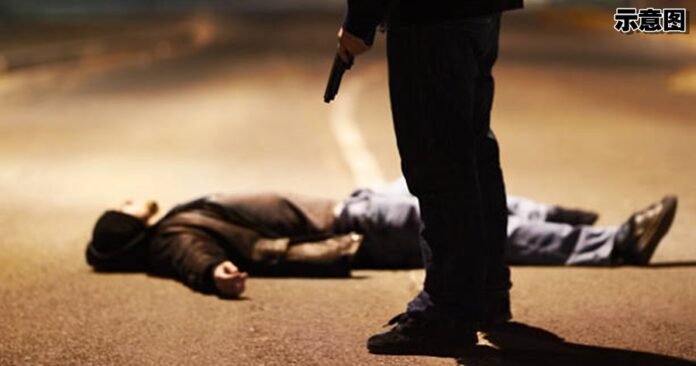 Man lying on the ground after being shot by a gun-wielding criminal