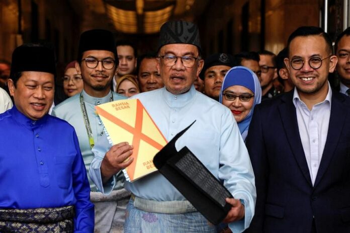 2023-02-24T073701Z554357060RC2JHZ9CI8RGRTRMADP3MALAYSIA-BUDGET