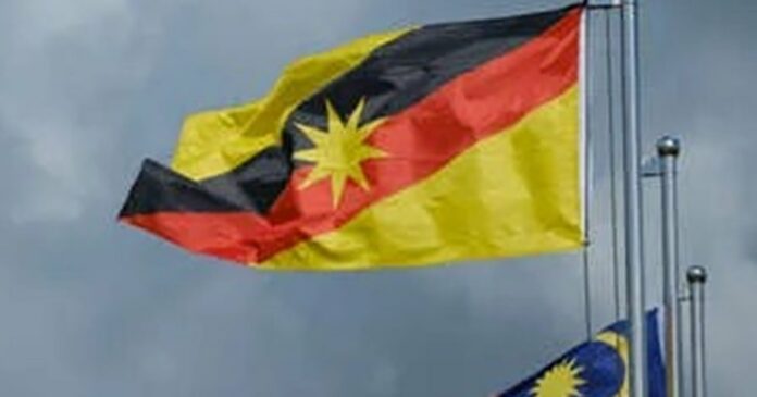 183779635-a-picture-of-sarawak-flag-waving-during-cloudy-day-sarawak-is-a-state-east-of-malaysia-at-borneo