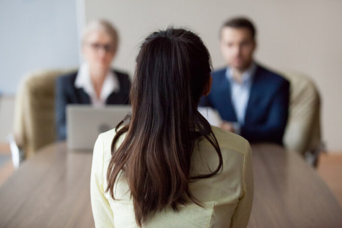 Businesswoman,And,Businessman,Hr,Manager,Interviewing,Woman.,Candidate,Female,Sitting