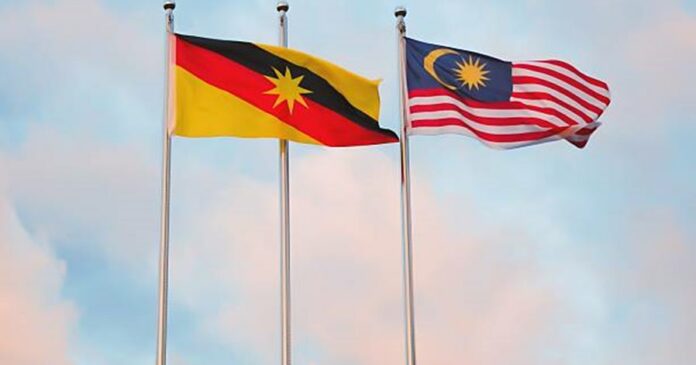 malaysian-flag-next-to-a-sarawakian-flag