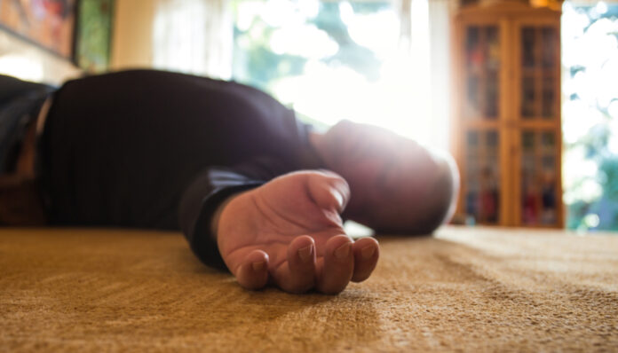 A,Man,Lies,Unconscious,In,His,Apartment